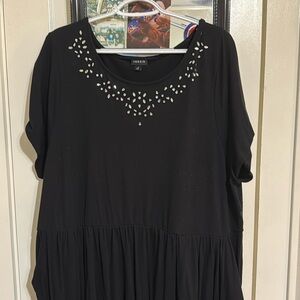 Black short sleeve dress with beaded neck line.
